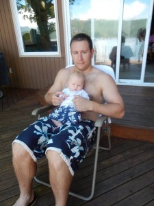 Theo and his daddy in matching swim trunks.
