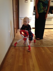 Playing with his new bike from Grandma and Grandpa.