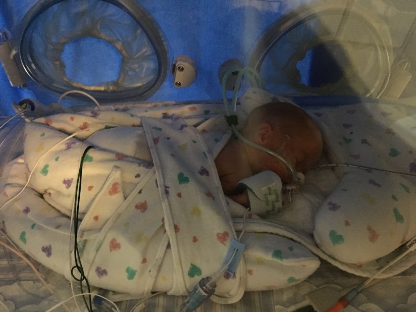 Tummy time (note, despite the fact that you aren't supposed to put infants on their tummies to sleep, it's actually good for preemies and helps them with their breathing - just thought I'd point that out so no one worries! :)